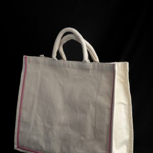 Canvas shopper with piping and webbed rope handle